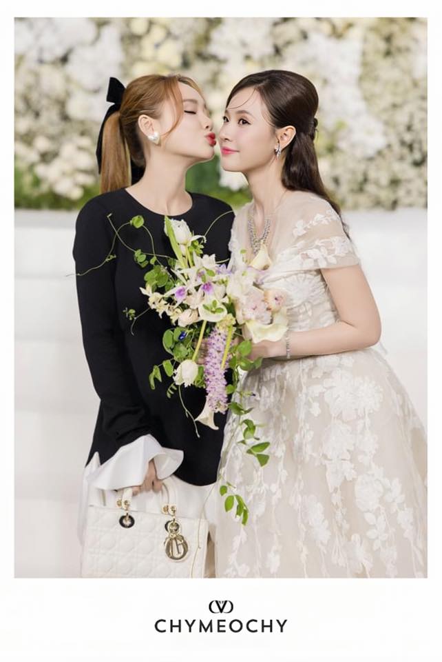Nha Phuong Shines in CHYMEOCHY’s Jabott Dress at Mi Du’s Wedding 4