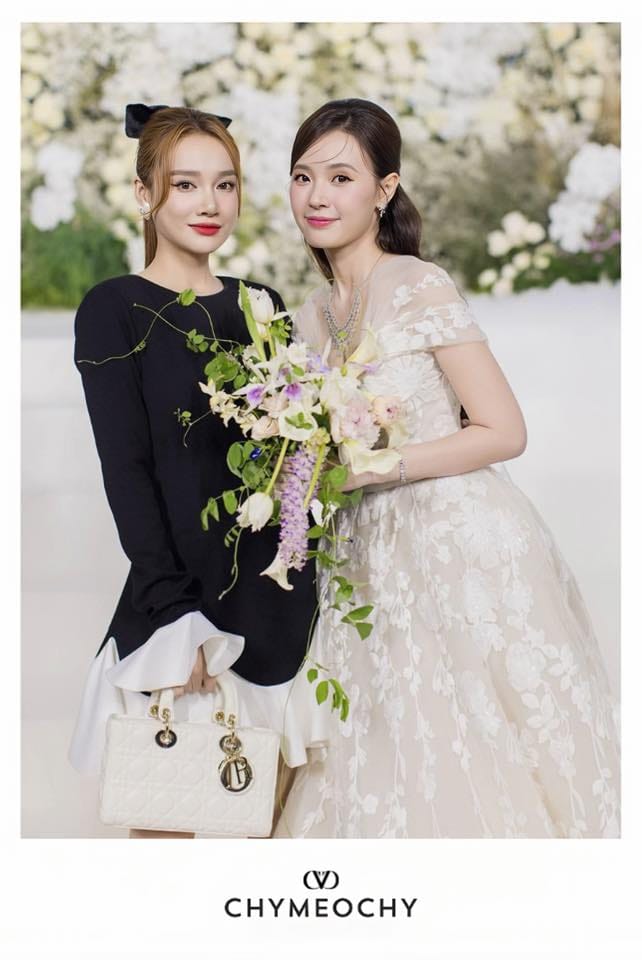 Nha Phuong Shines in CHYMEOCHY’s Jabott Dress at Mi Du’s Wedding 3