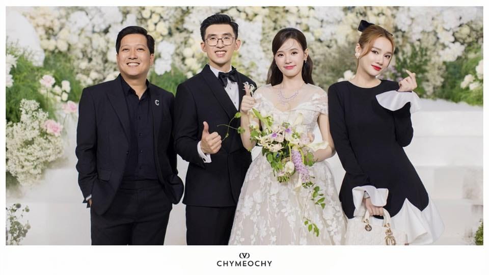 Nha Phuong Shines in CHYMEOCHY’s Jabott Dress at Mi Du’s Wedding 3